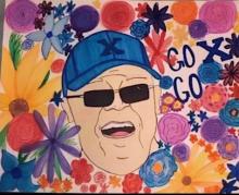 Painting of StFX's Father Stan surrounded by colorful flowers and text that reads "Go X Go"
